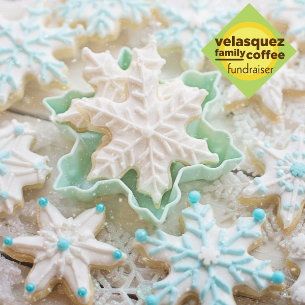 Sugared Snowflake flavored coffee sweet, warm buttery sugar cookie fresh from the oven. Image of frosted snowflake cookies 